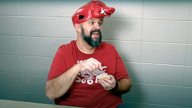 SEC Roll Call depicts Arkansas struggling to eat its Kent State cupcake.